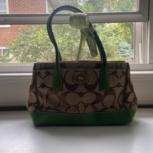 Green and tan hand bag